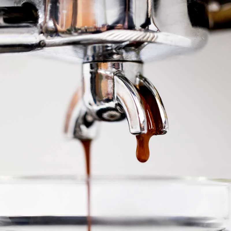 Espresso pouring from the machine
