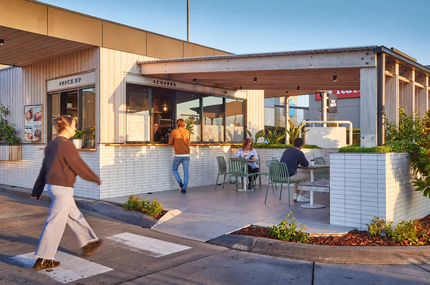Bean Squeeze walk-up window, outdoor seating and landscaping